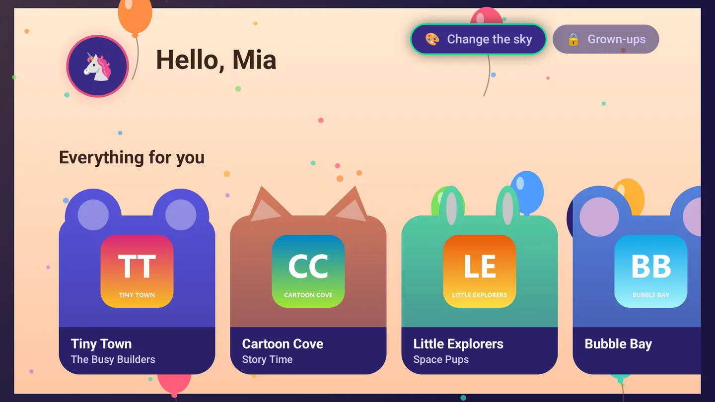 The kids home screen with balloons over a warm sky: Hello, Mia, and the channels as animal-shaped cards with each channel's logo for a face.