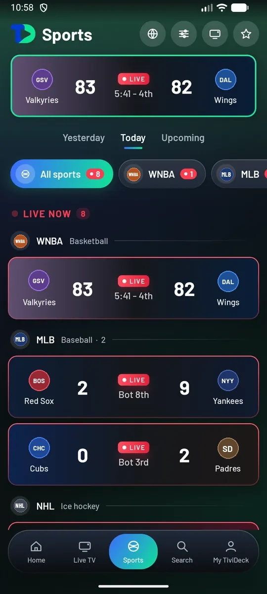 The Sports tab: a live WNBA game at the top, Yesterday, Today and Upcoming, chips for All sports, WNBA and MLB with live counts, and Live now with eight games, including Red Sox 2, Yankees 9 in the bottom of the 8th.